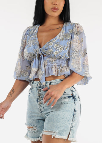 Image of Front Knot Ruffle Hem Floral Crop Top Blue